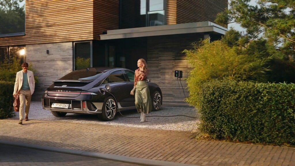A family charged Hyundai Ioniq 6 at home and the charger installed at wall