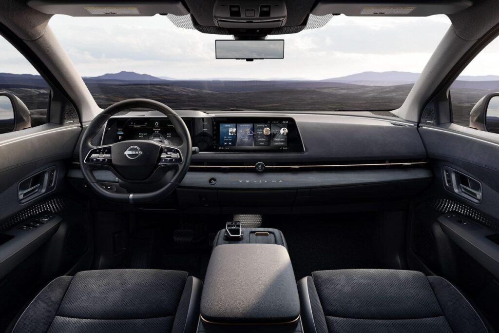 simple interior of Nissan Ariya with touch screen and cluster board