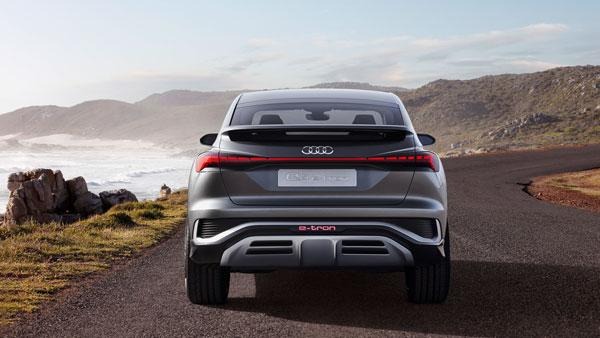 beautiful Audi Q4 Sportback e-tron stand stand on the road with mountain background